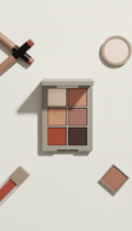 Neutral eyeshadow palette, Three-quarter product angles on compact blocks matching the brand’s neutral palette; products...