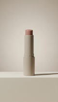 Nourishing Tinted Lip Balm, Default camera angle: 3/4 product portrait to reveal both form and surface detail, positioned...